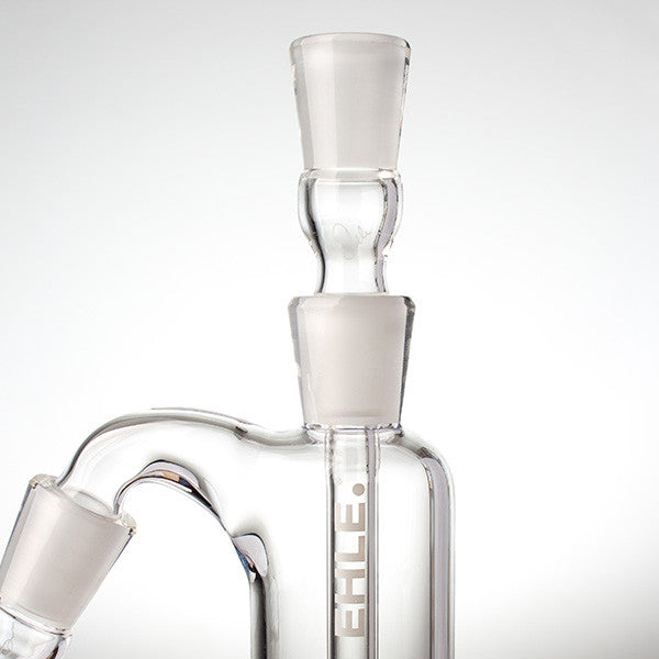 An EHLE glass Pre-Cooler 14mm with a Black label close up